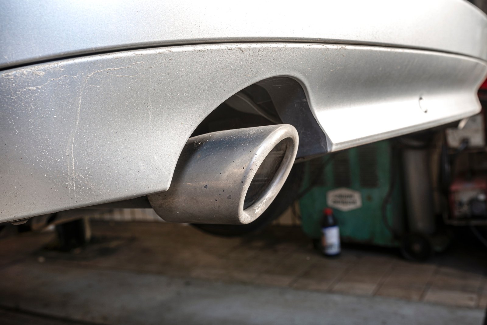 the exhaust system in the diesel car seen up close view from rear of muffler